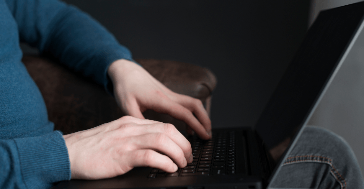 typing on a laptop