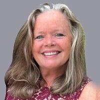 carol warner headshot_grey background